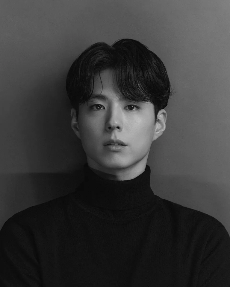 Black and white portrait of Park Bo-gum, Korean actor featured in When Life Gives You Tangerines