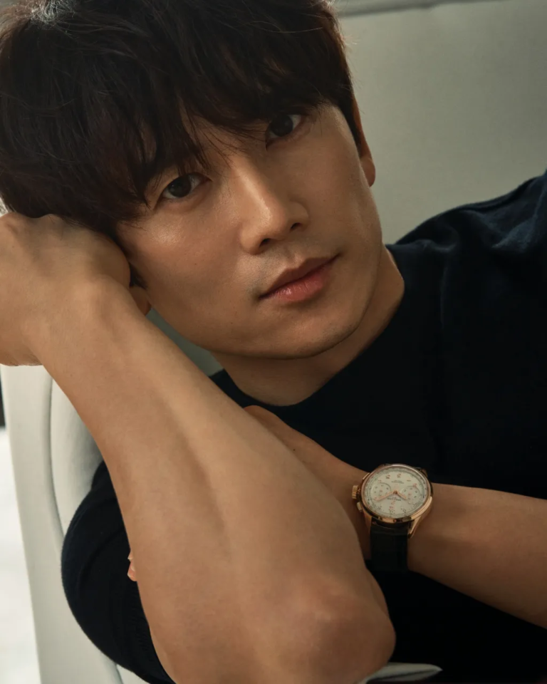 A professional profile picture of Korean actor Ji Sung, gazing forward with intense, deep eyes and a serious expression, optimized for the K-drama The Apartment Job review